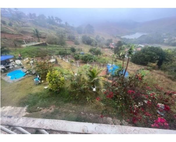 Foto de SIMÃO PEREIRA/MG – Casa e seu respectivo lote com a área de 1.257,00m², situado no Loteamento Miragem