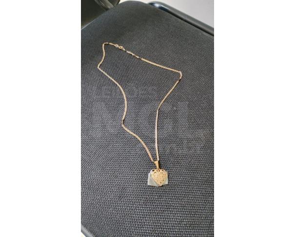 Foto de COROMANDEL/MG - GARGANTILHA CORDÃO TIPO COLAR DE OURO COM PINGENTE EM FORMATO DE CORAÇÃO.