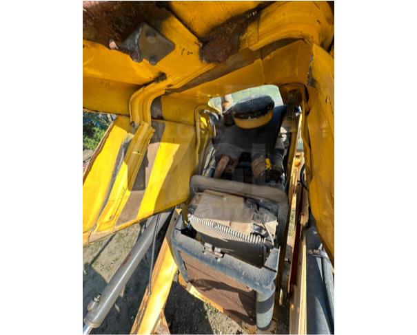 Foto de Marataízes/ES- Retroescavadeira New Holland, modelo B95B