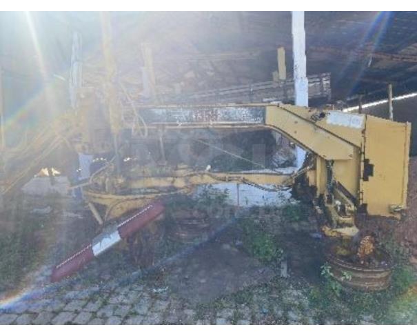 Foto de PORCIÚNCULA/RJ - Motoniveladora Caterpillar modelo 135H 