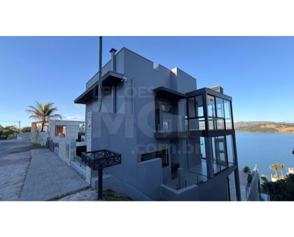 Foto de CAPITÓLIO/MG- CASA DE ALTO PADRÃO EM ESCARPAS DO LAGO (IMOVEL DESOCUPADO) 