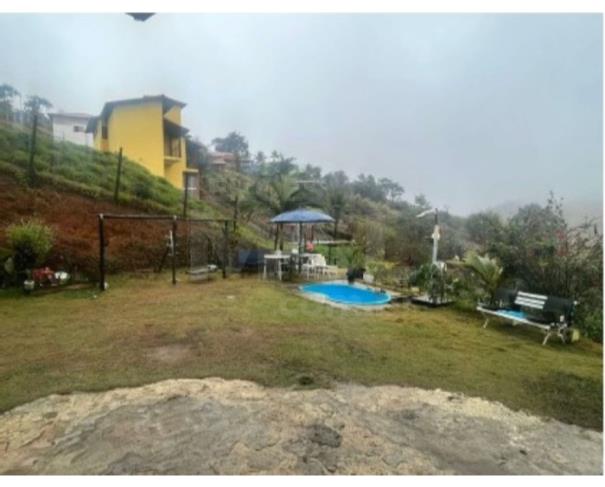 Foto de SIMÃO PEREIRA/MG – Casa e seu respectivo lote com a área de 1.257,00m², situado no Loteamento Miragem
