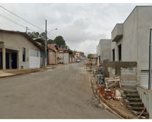 Foto de MUNHOZ/MG — [Fração ideal de 50% sobre] uma casa e seu respectivo terreno