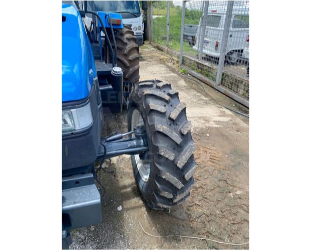 Foto de CONTAGEM MG - TRATOR DE PNEUS NEW HOLLAND TL 75 ANO 2012 COM 2.900H