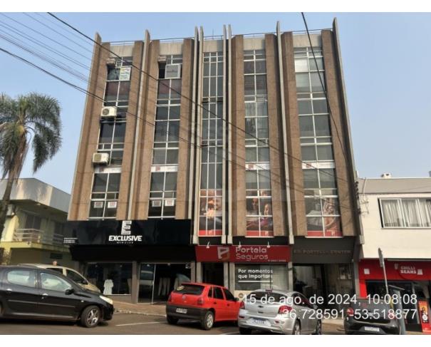 São miguel do oeste/sc - a sala comercial nº 201, sito no 2º andar do edifício portella center, sito na rua 15 de novembro, na cidade de são miguel do oeste, 452 lote em leilão | mgl leilões