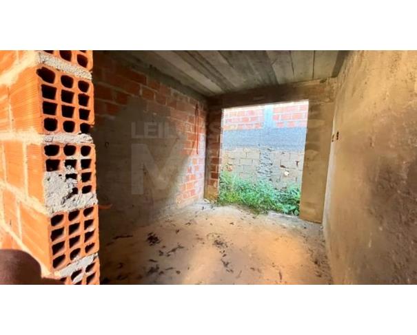 Foto de IGUATAMA/MG – Lote com a área de 200,00m², com uma construção inacabada, situado no Centro