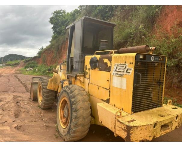 Foto de PIEDADE DE CARATINGA/MG - Pá Carregadeira New Holland 12C