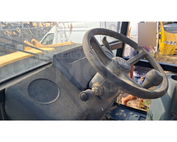 Foto de ASSARÉ/CE - Retroescavadeira JCB, modelo 3C. 