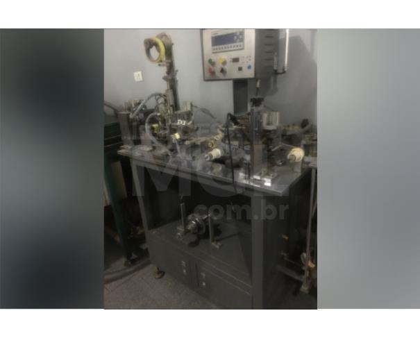 Foto de Ouro Fino/MG -  Máquina de confeccionar blindagem de cobre